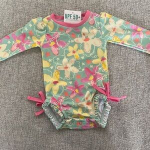 Darling tropical print Ruffle Butts Rugged Butts swimsuit. 3-6 months. NWT